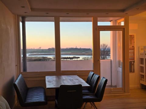 Moderne Wohnung mit Sonnenuntergang über dem Meer Apartment in Heiligenhafen