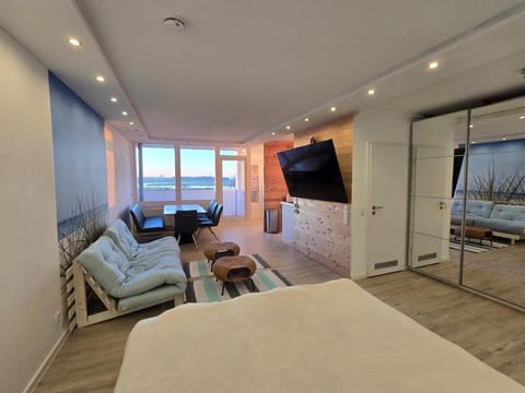 Moderne Wohnung mit Sonnenuntergang über dem Meer Apartment in Heiligenhafen