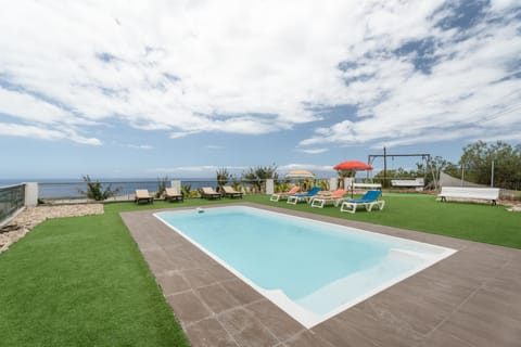 Property building, Living room, Swimming pool
