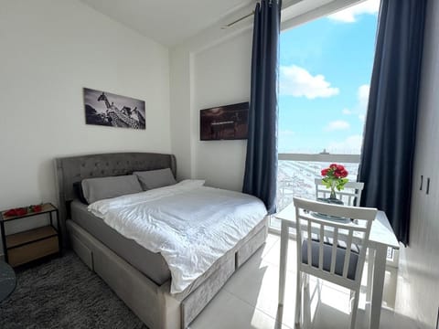 Bed, Natural landscape, View (from property/room), Living room, Seating area, Bedroom