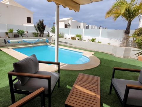 Patio, Seating area, Pool view, Swimming pool