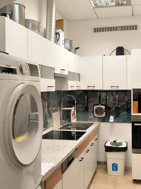 Kitchen or kitchenette, dishwasher, stove, washing machine, dryer