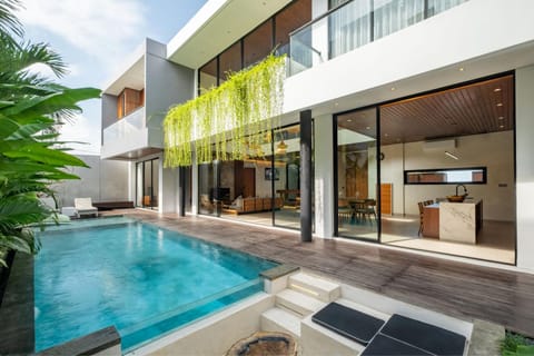 Property building, Patio, Natural landscape, Pool view, Swimming pool, sunbed