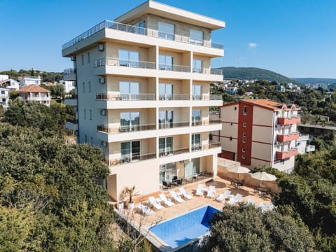 Property building, Patio, Day, Natural landscape, View (from property/room), Balcony/Terrace, Pool view, Sea view, Swimming pool