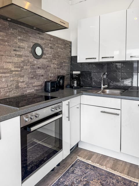 Kitchen or kitchenette, stove, kitchen