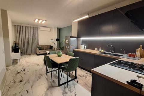 Kitchen or kitchenette, Living room, Seating area, Dining area, stove