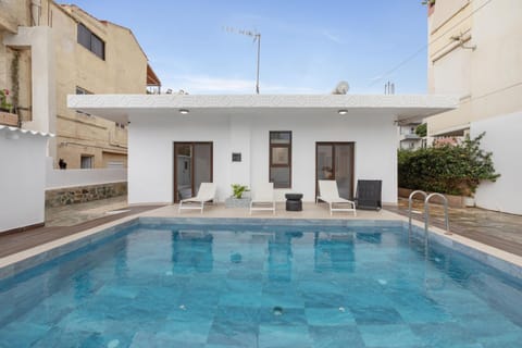 Property building, Living room, Swimming pool