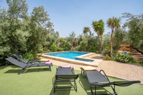 Property building, Living room, Swimming pool