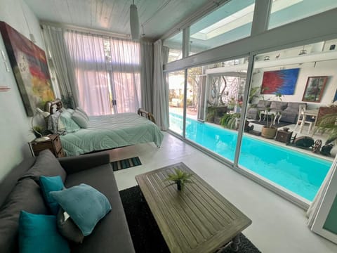 Bed, Living room, Photo of the whole room, Bedroom, Pool view, Swimming pool