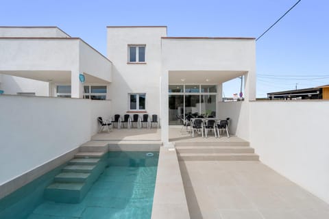 Property building, Living room, Swimming pool