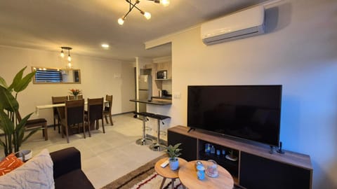 TV and multimedia, Living room, Dining area, Garden view, air conditioner