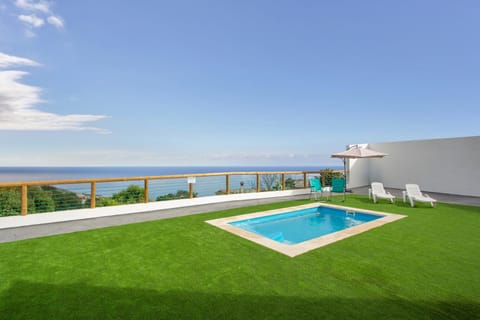 Property building, Living room, Swimming pool