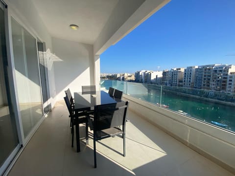Property building, Day, View (from property/room), Balcony/Terrace, Living room, Seating area, Dining area, Sea view