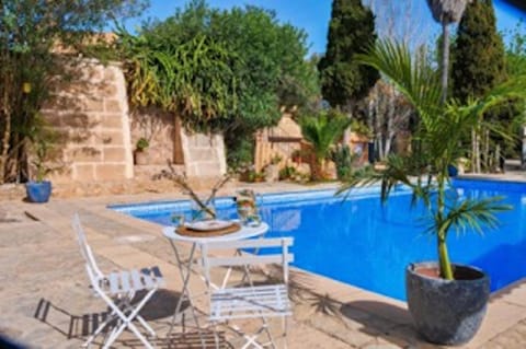 Property building, Living room, Swimming pool