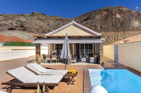 Property building, Patio, Natural landscape, Dining area, Mountain view, Pool view