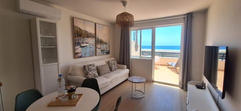 Living room, Seating area, Dining area, Sea view