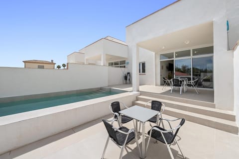 Property building, Living room, Swimming pool