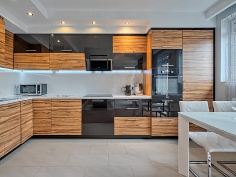 Kitchen or kitchenette, oven, stove