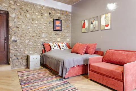 Bed, Living room, Seating area, Bedroom