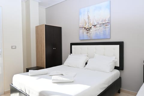 Bed, Bedroom, towels, wardrobe