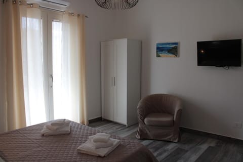 Bed, TV and multimedia, Bedroom, towels, wardrobe, air conditioner