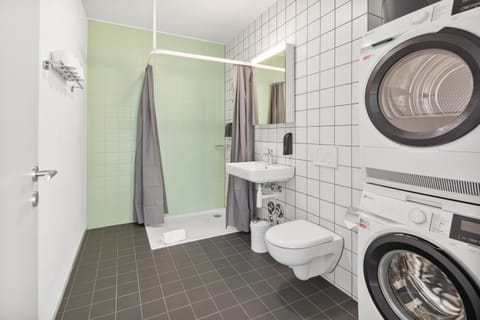 Shower, Toilet, Bathroom, towels, washing machine, dryer