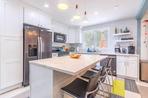 Experience lakeside tranquility at The 9 House in Douglas