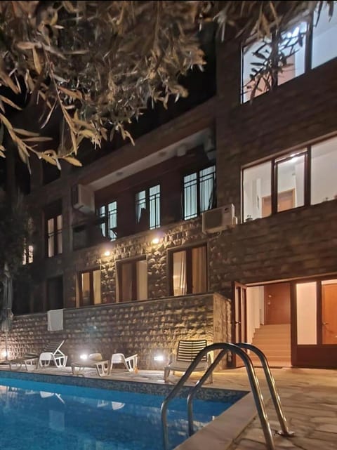 Property building, Facade/entrance, Night, Swimming pool