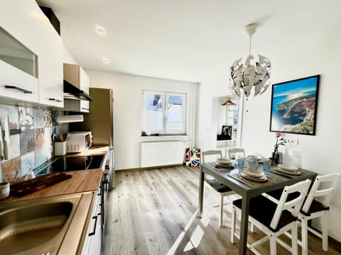 Kitchen or kitchenette, Kitchen or kitchenette, Seating area, Dining area, microwave, oven, stove