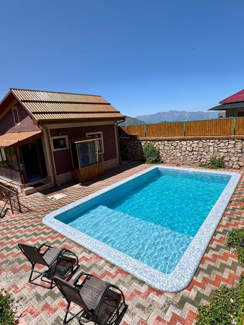 Property building, Day, Natural landscape, Mountain view, Pool view, Swimming pool, sunbed