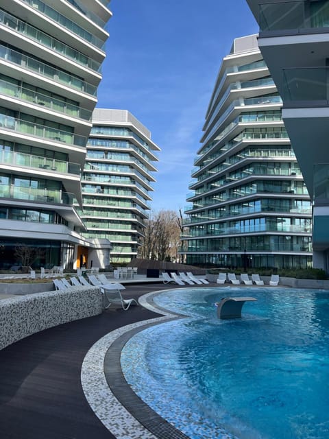 Property building, Swimming pool, Swimming pool, sunbed