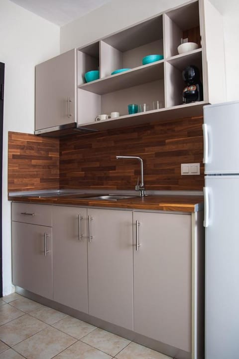 Kitchen or kitchenette, stove