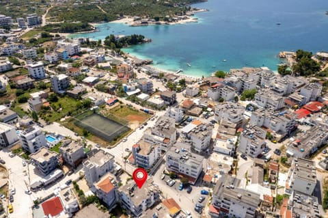 Property building, Nearby landmark, Day, Neighbourhood, Natural landscape, Bird's eye view, Beach, City view, Sea view, Street view, Location