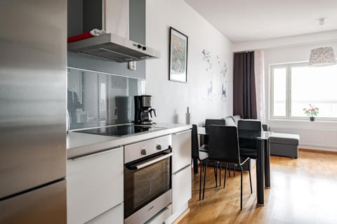 Living room, Seating area, Dining area, dishwasher, oven, stove, toaster