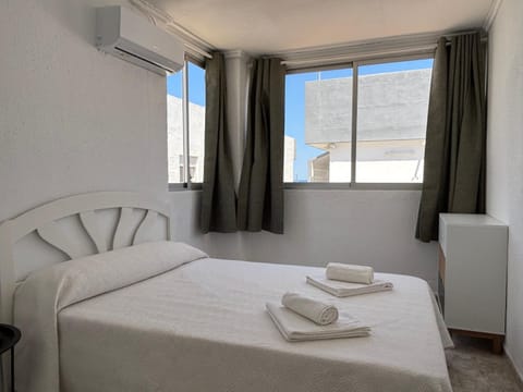 Bed, Photo of the whole room, Bedroom, towels, air conditioner