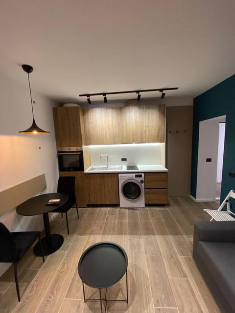 Kitchen or kitchenette, stove, washing machine