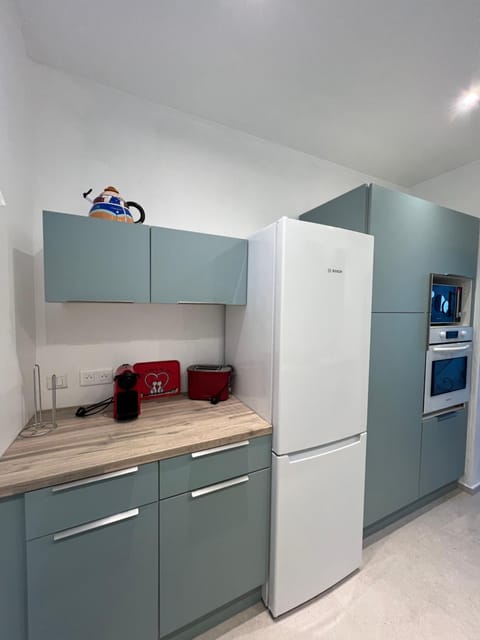 Kitchen or kitchenette, oven, toaster