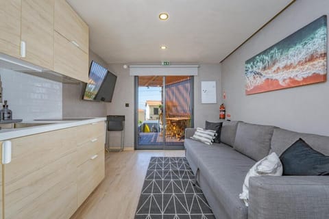 TV and multimedia, Kitchen or kitchenette, Living room, Seating area, Bedroom