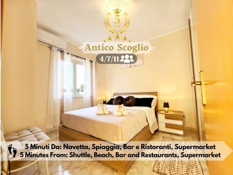 Bed, Property logo or sign, Photo of the whole room, Logo/Certificate/Sign, Bedroom, Text overlay, towels, air conditioner, air conditioner