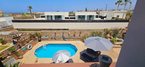 Property building, Patio, Pool view, sunbed