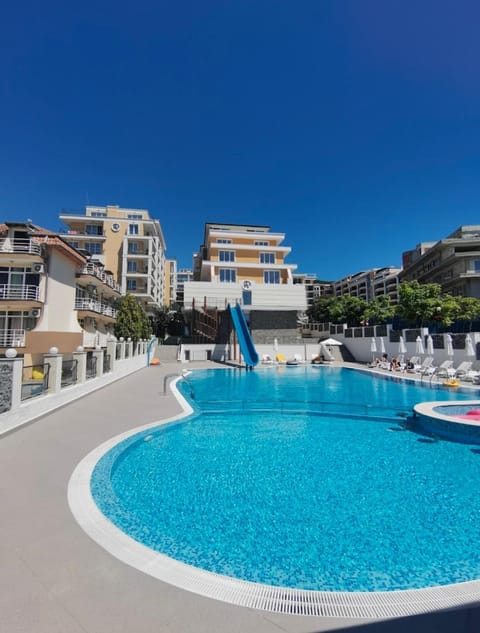 Property building, Pool view, Swimming pool, sunbed