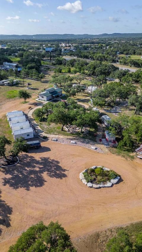 Newly Renovated Camper with Fresh Decor and Tiny Deck in Texas House in Lake Travis
