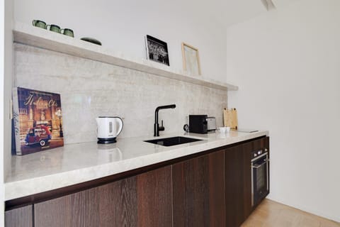 Kitchen or kitchenette, stove, toaster