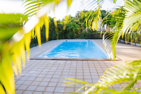 Property building, Day, Garden, View (from property/room), Garden view, Pool view, Swimming pool