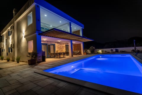 Property building, Night, Pool view, Swimming pool