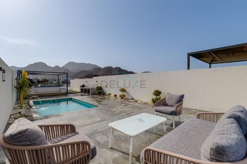Patio, View (from property/room), Seating area, Mountain view, Pool view, Swimming pool