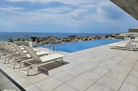 Property building, Living room, Swimming pool