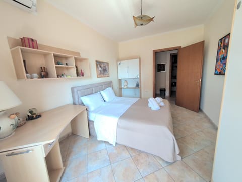 Bed, Bedroom, towels, wardrobe, air conditioner