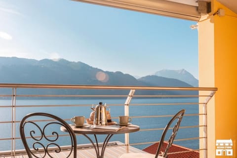 View (from property/room), Balcony/Terrace, Lake view, Mountain view