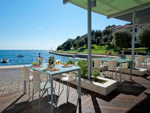 Patio, Restaurant/places to eat, Facade/entrance, Food close-up, Balcony/Terrace, Lounge or bar, Other, Decorative detail, Beach, Evening entertainment, Food, Sea view, Area and facilities, Lunch, Dinner, Drinks, Alcoholic drinks, Non alcoholic drinks